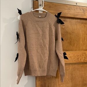 Elegant Brown Sweater with Black Bow Accents